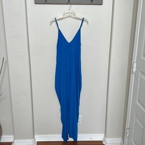 Beautiful flowy dress to dress up or to wear with cute flip flops!